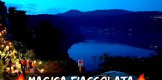 Magica fiaccolata sotto le stelle cadenti a picco sul Lago
